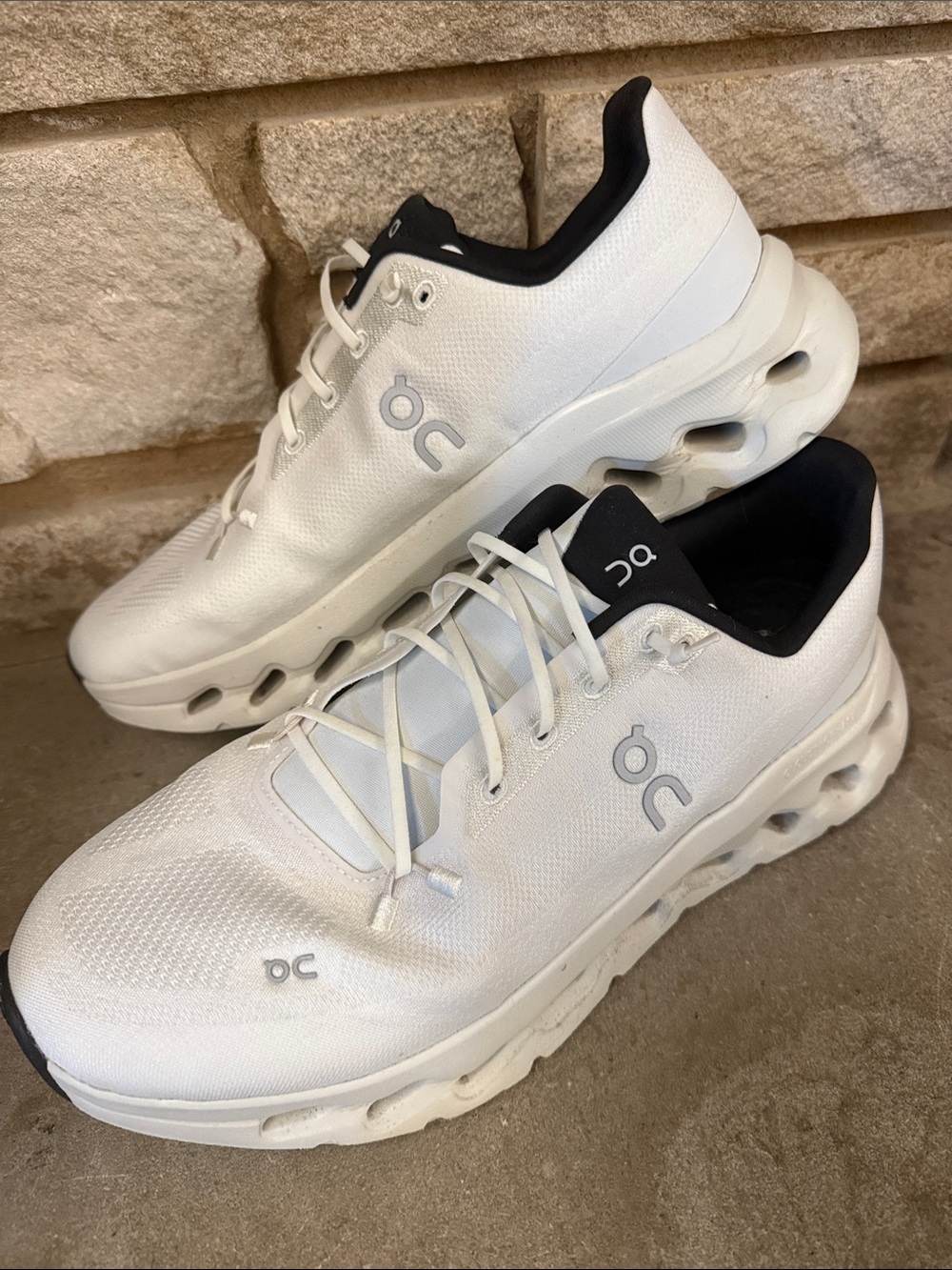 On Running White Athletic Sneakers with Black Collar